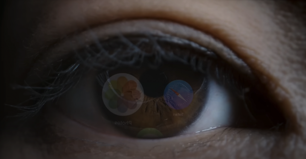 Close-up image of an eye reflecting Apple app icons